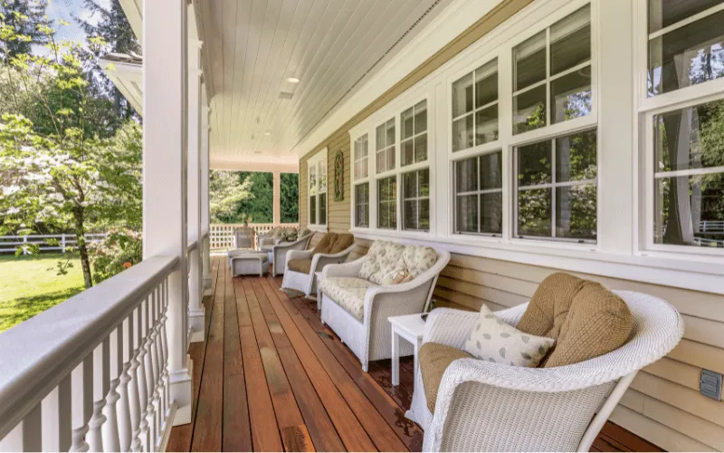 long-wood-stained-deck-white-ballusters-columns_result